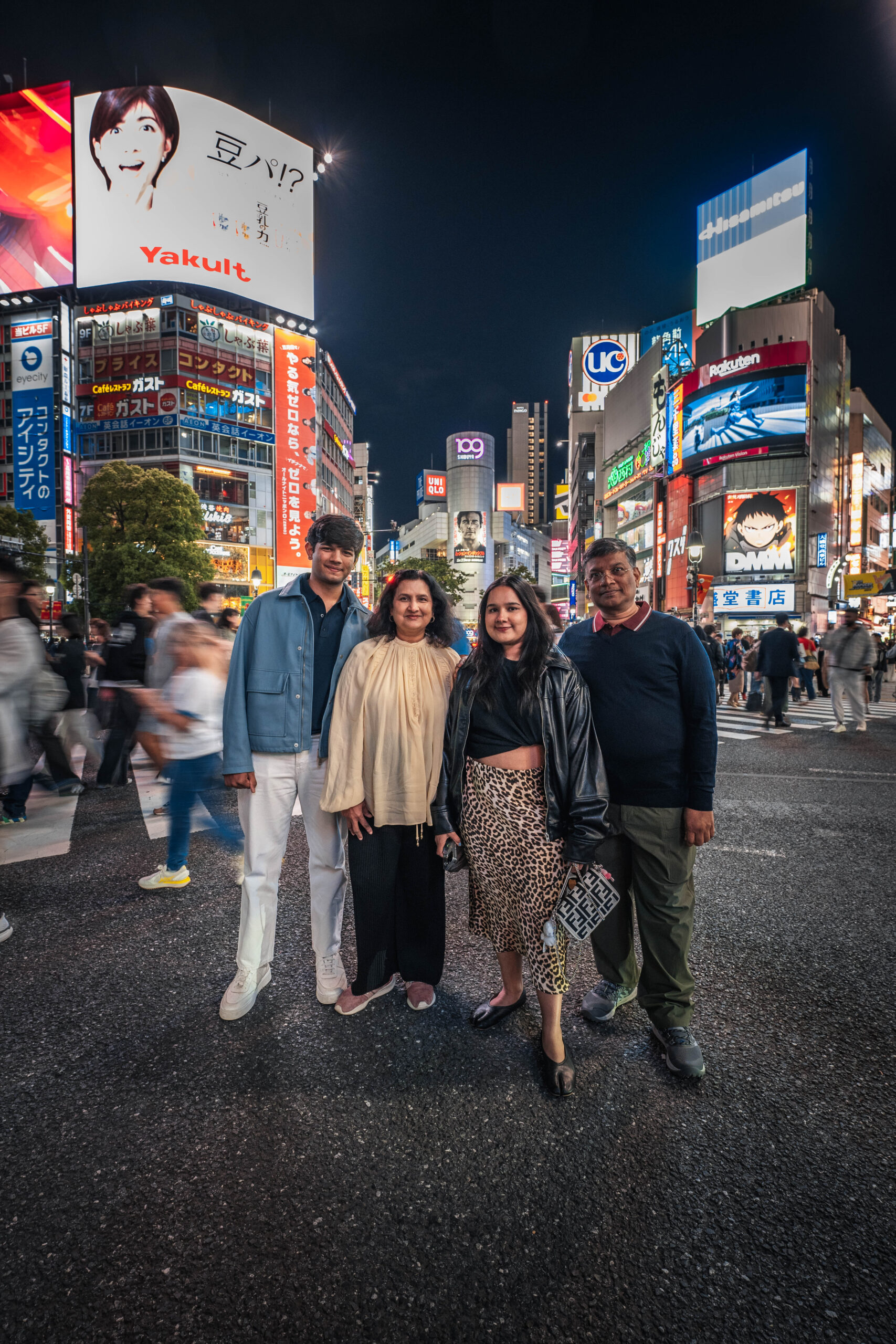 family photoshoot at Shibuya Crossing Tokyo at night