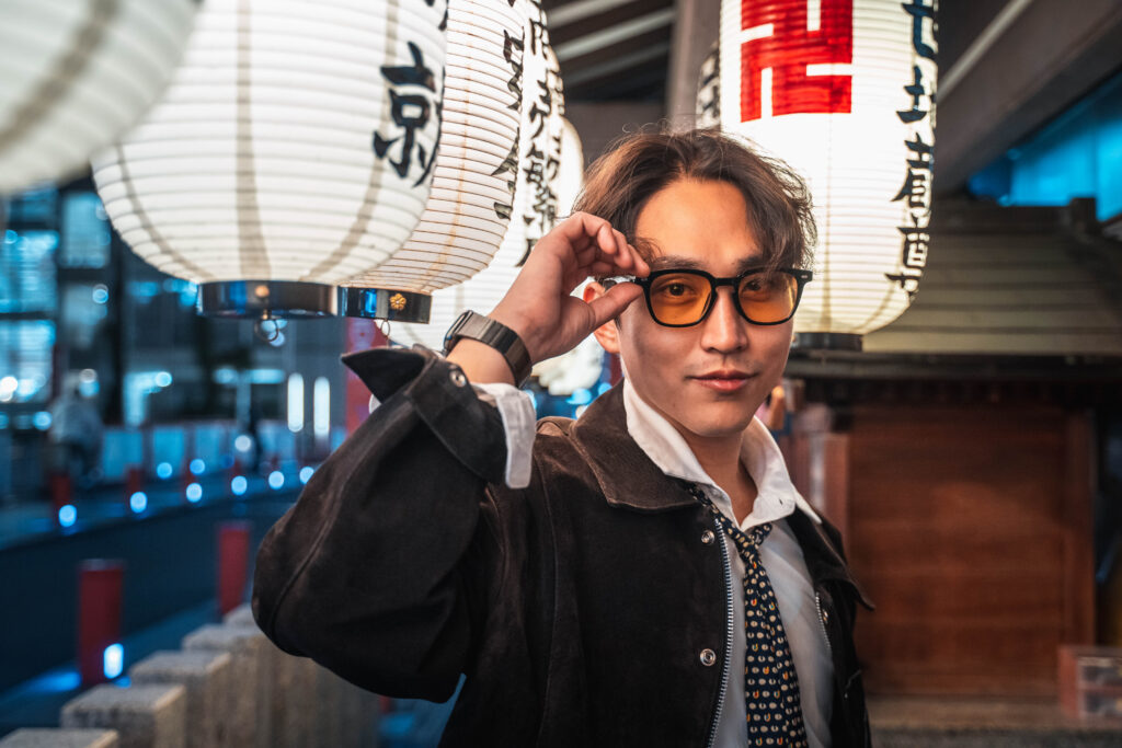 male portrait posing at Hozenji Temple in Osaka Dotonbori