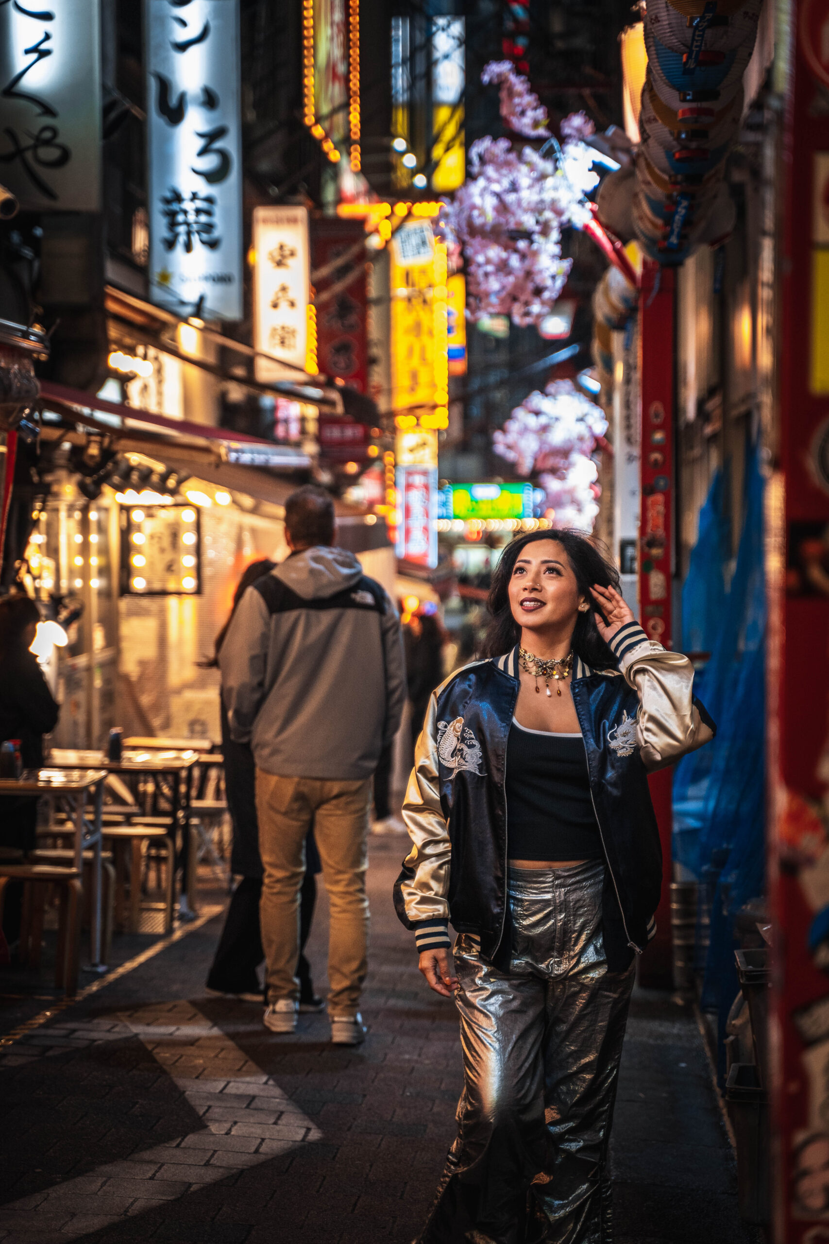 solo traveler walking in Omoide Yokocho Shinjuku Tokyo